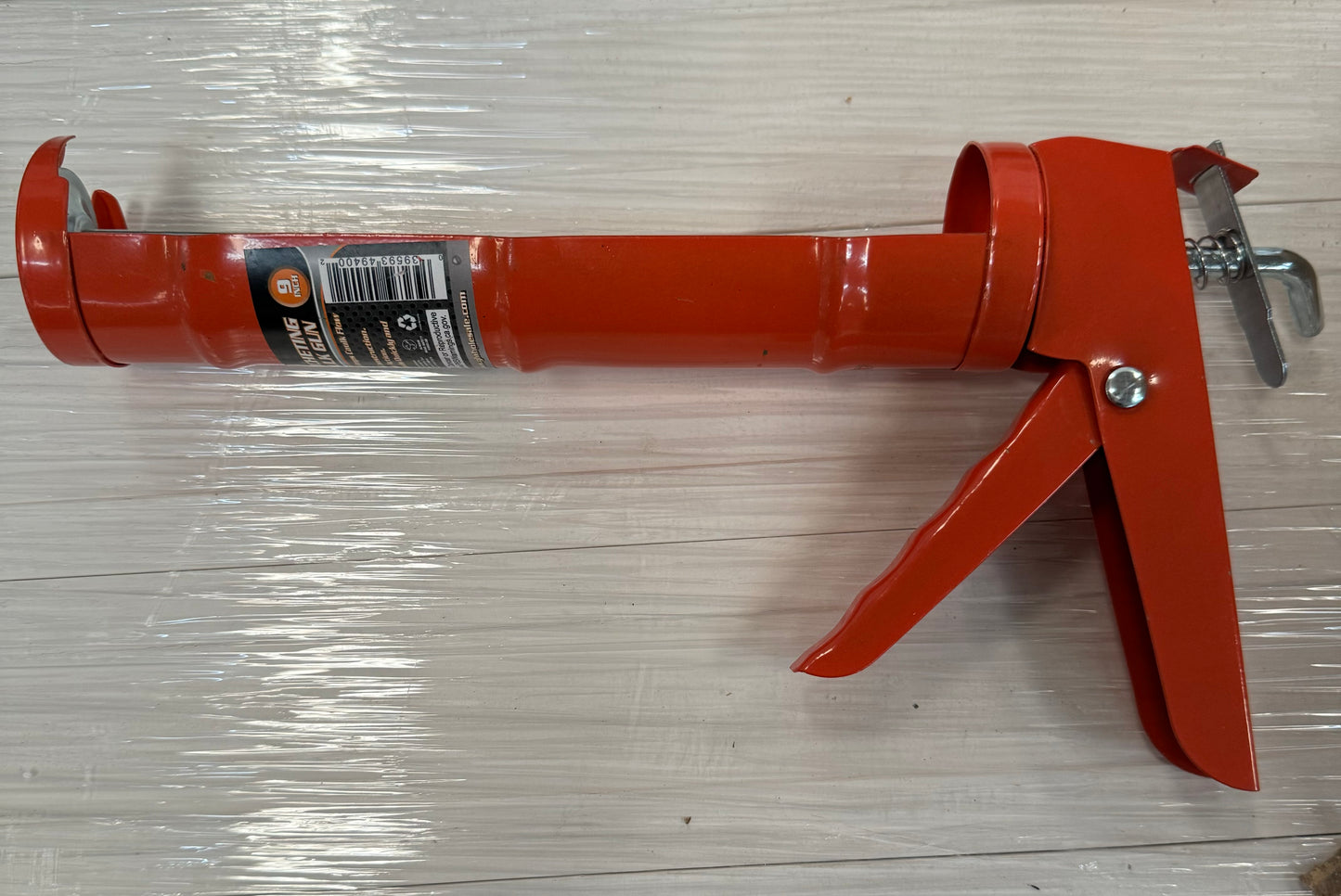 RATCHETING CAULK GUN