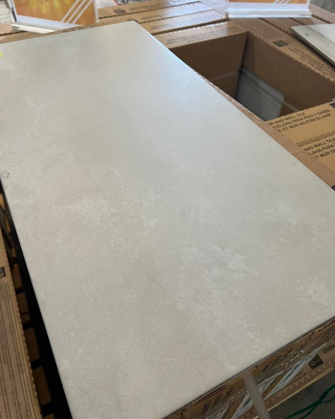 I449 CONCRETE WHITE 12x24 49¢sqft